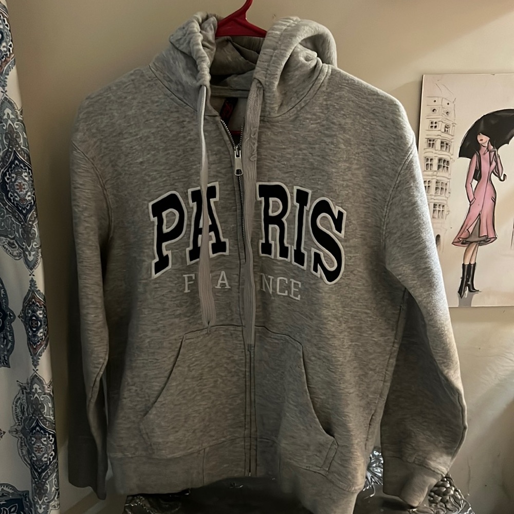 Women’s small hoodie by Famous.